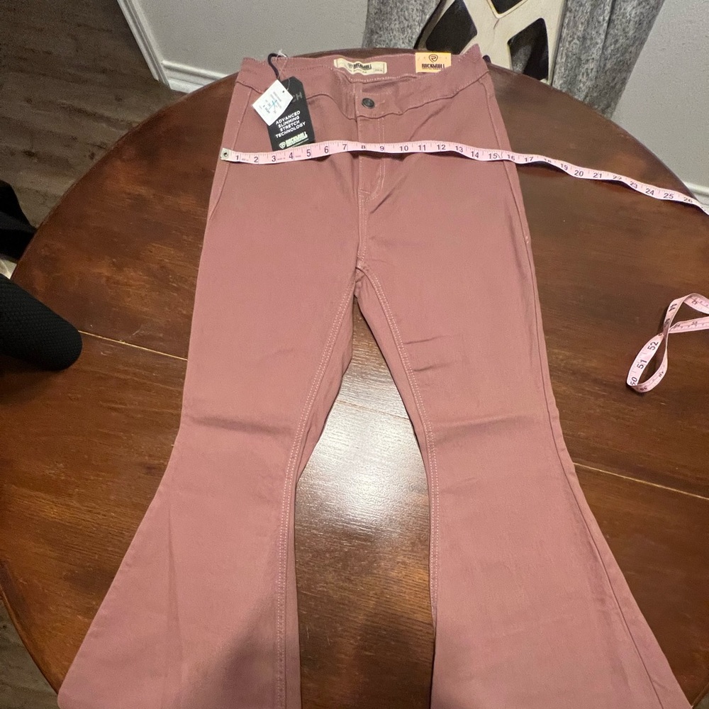Rock and Roll cowgirl. Extra soft flexable jeans in a dusty mauve color